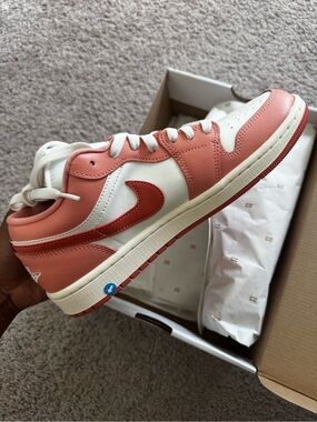 Nike Low-Top Sneaker in Coral and White with Red Swoosh